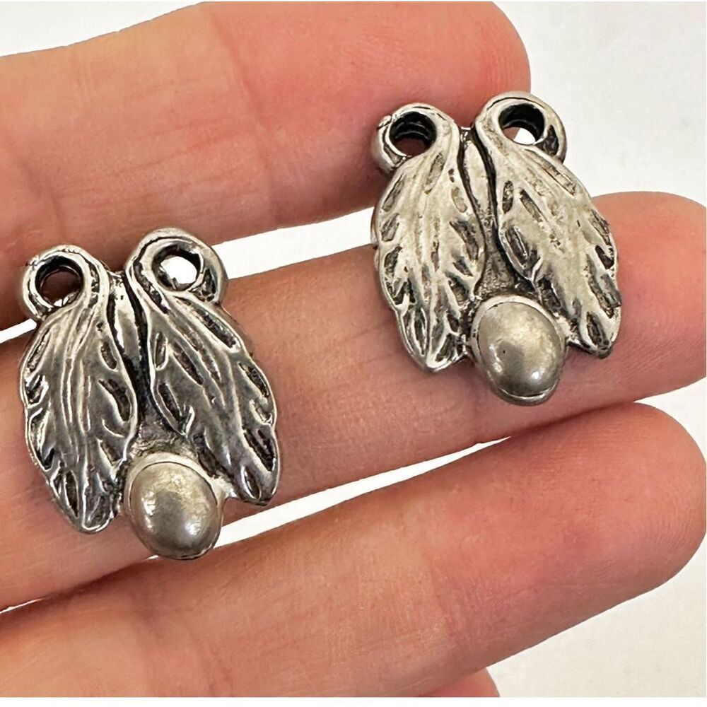 Silver tone leaf clip on earrings